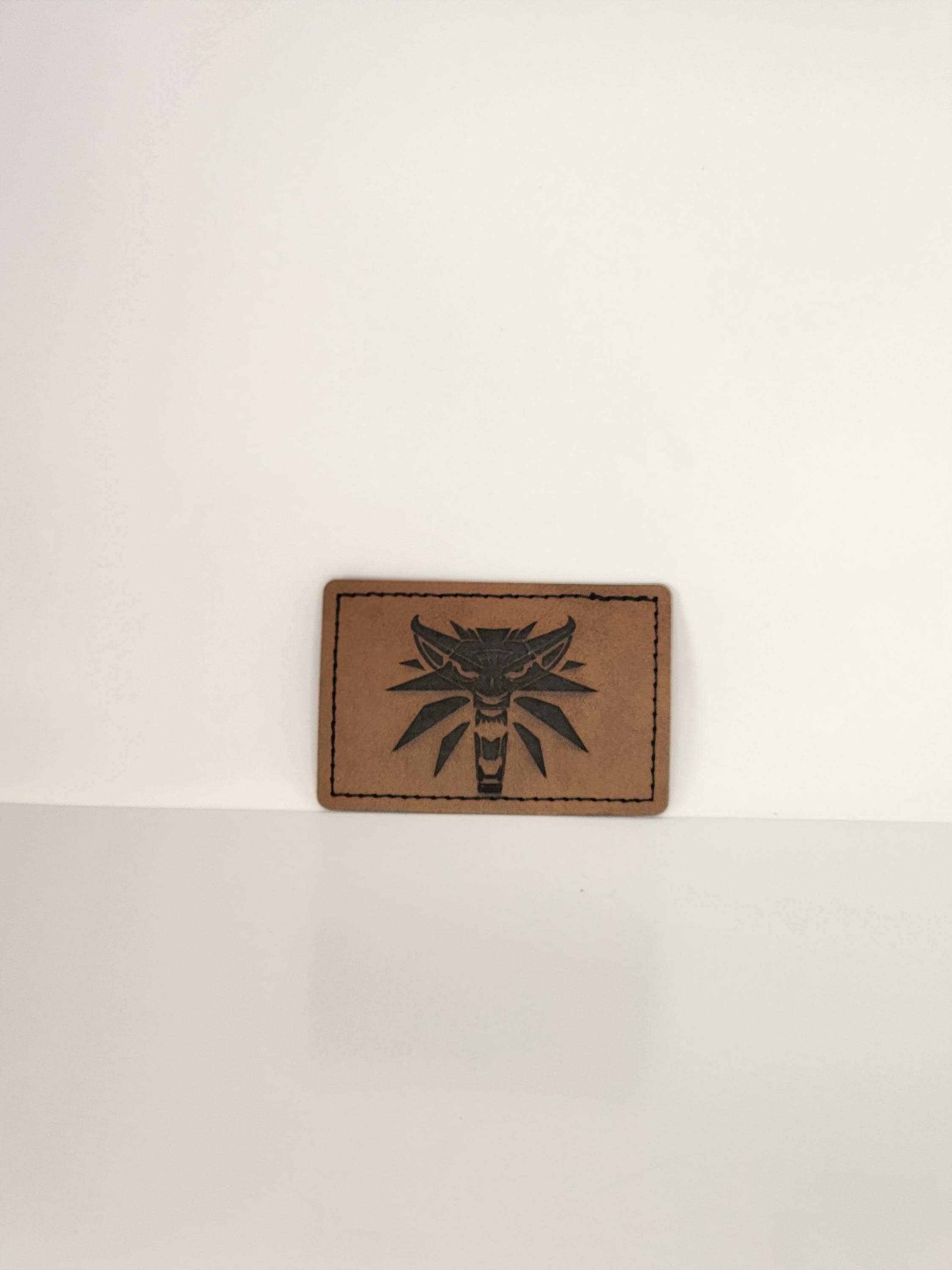 Engraved patches. Faux leather iron on.