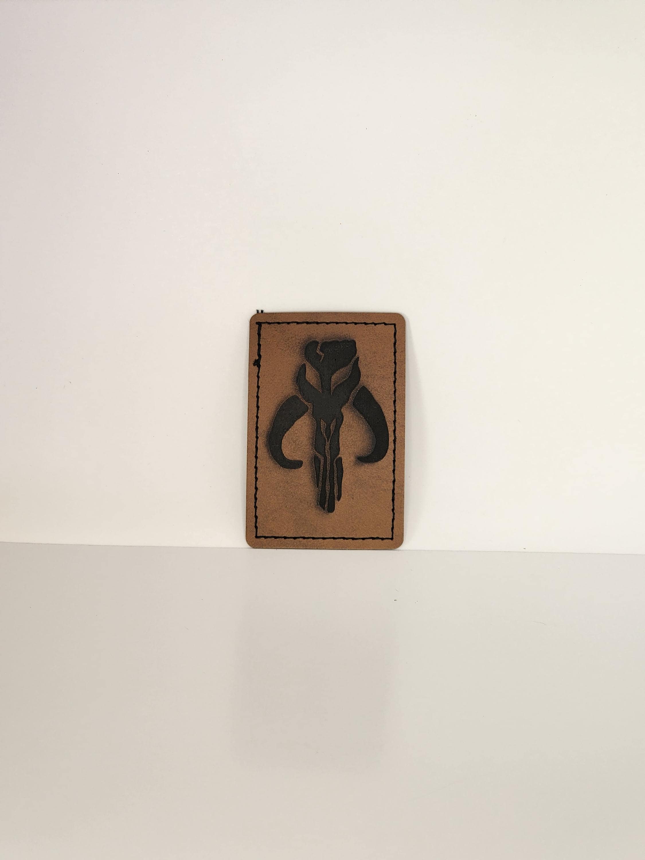 Engraved patches. Faux leather iron on.